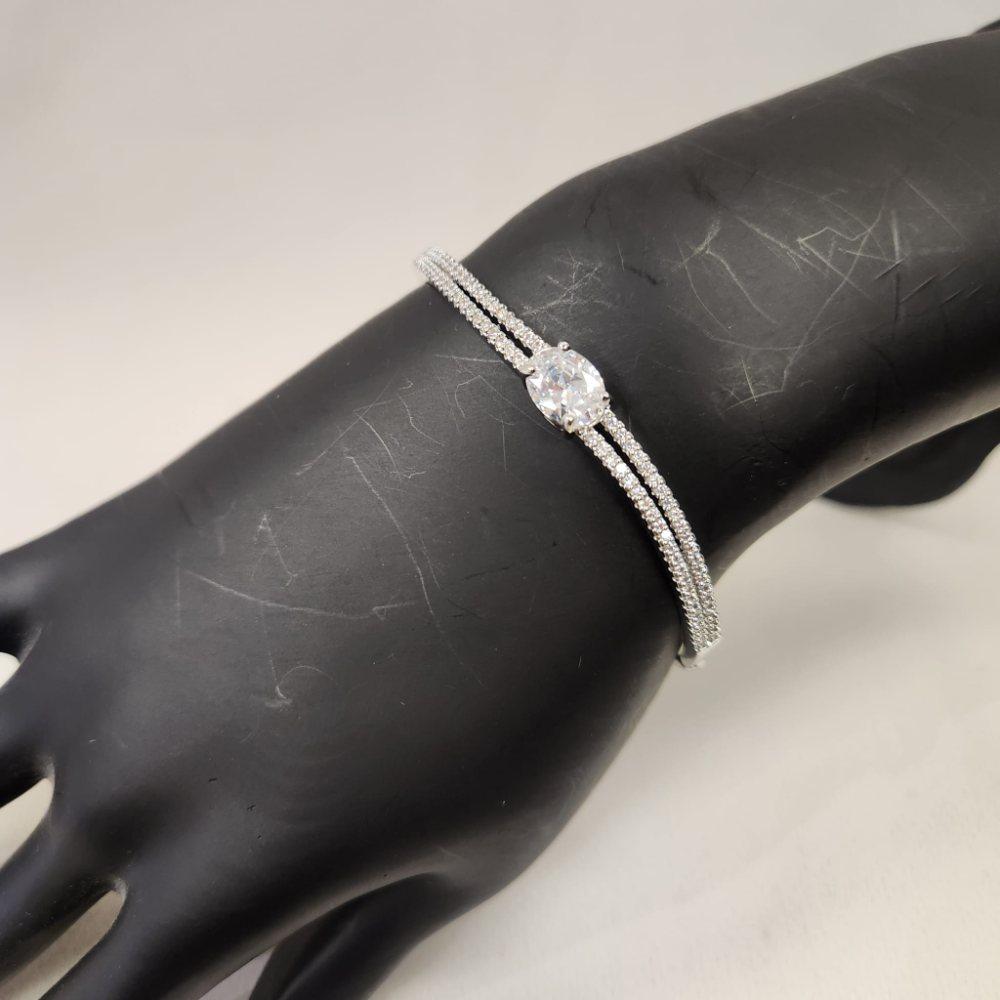 Detailed view of Dainty silver bracelet with clear stones