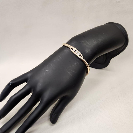 Fancy gold bracelet with stones