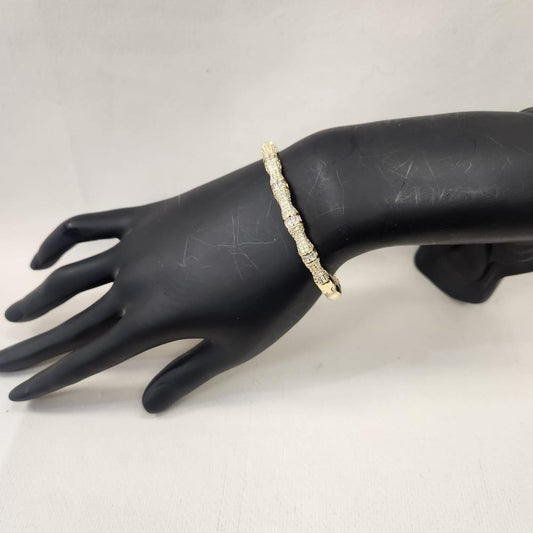 Exquisite gold bracelet with dazzling stones