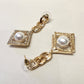 Push back post of Gold frame dangle earrings with pearl and stone setting 