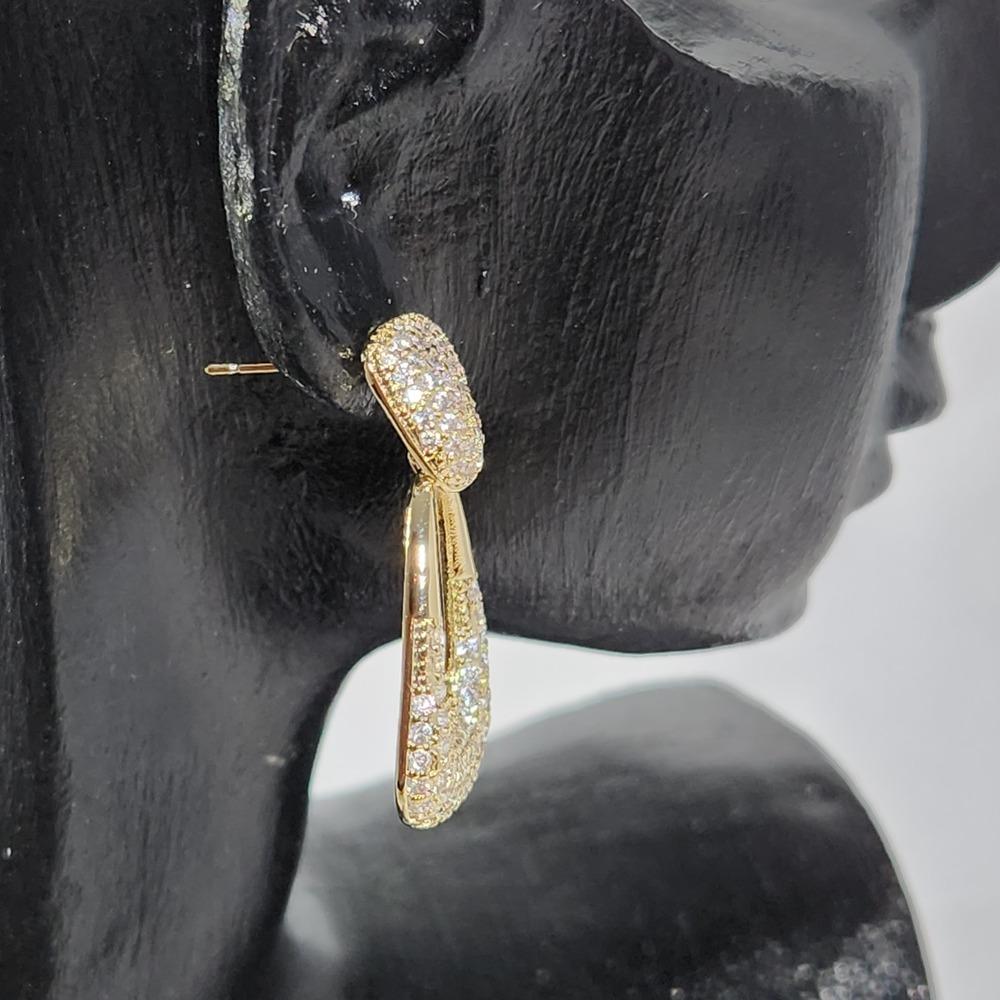 Side view of modern dangle earring