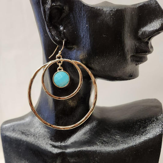 Dangle earrings with concentric loops and turquoise stone