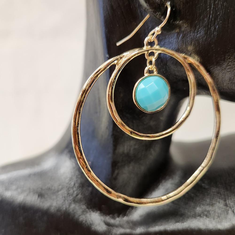 Another view of dangle earrings with concentric loops