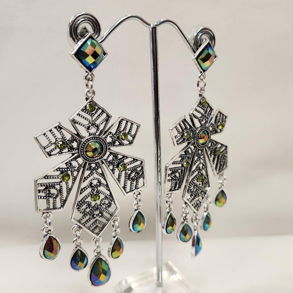 Another view of Long dangle earrings with dual tone stones