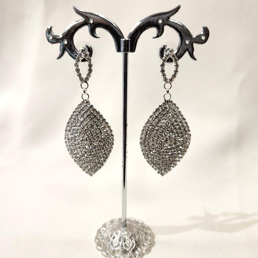 Silver color long stone studded dangle earrings