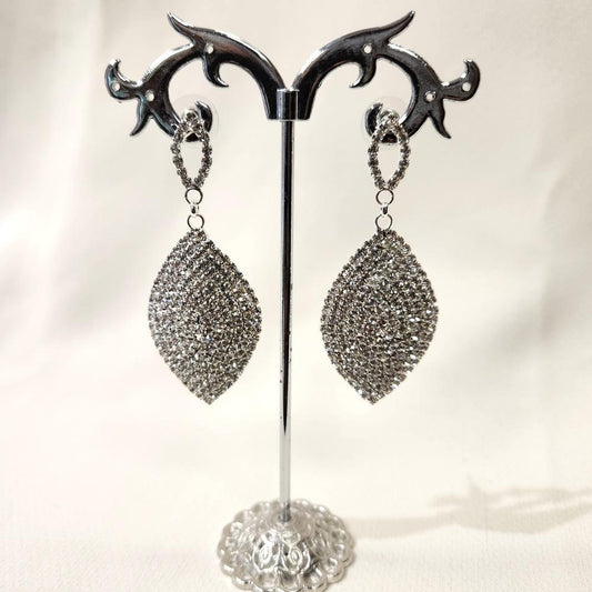 Silver color long stone studded dangle earrings