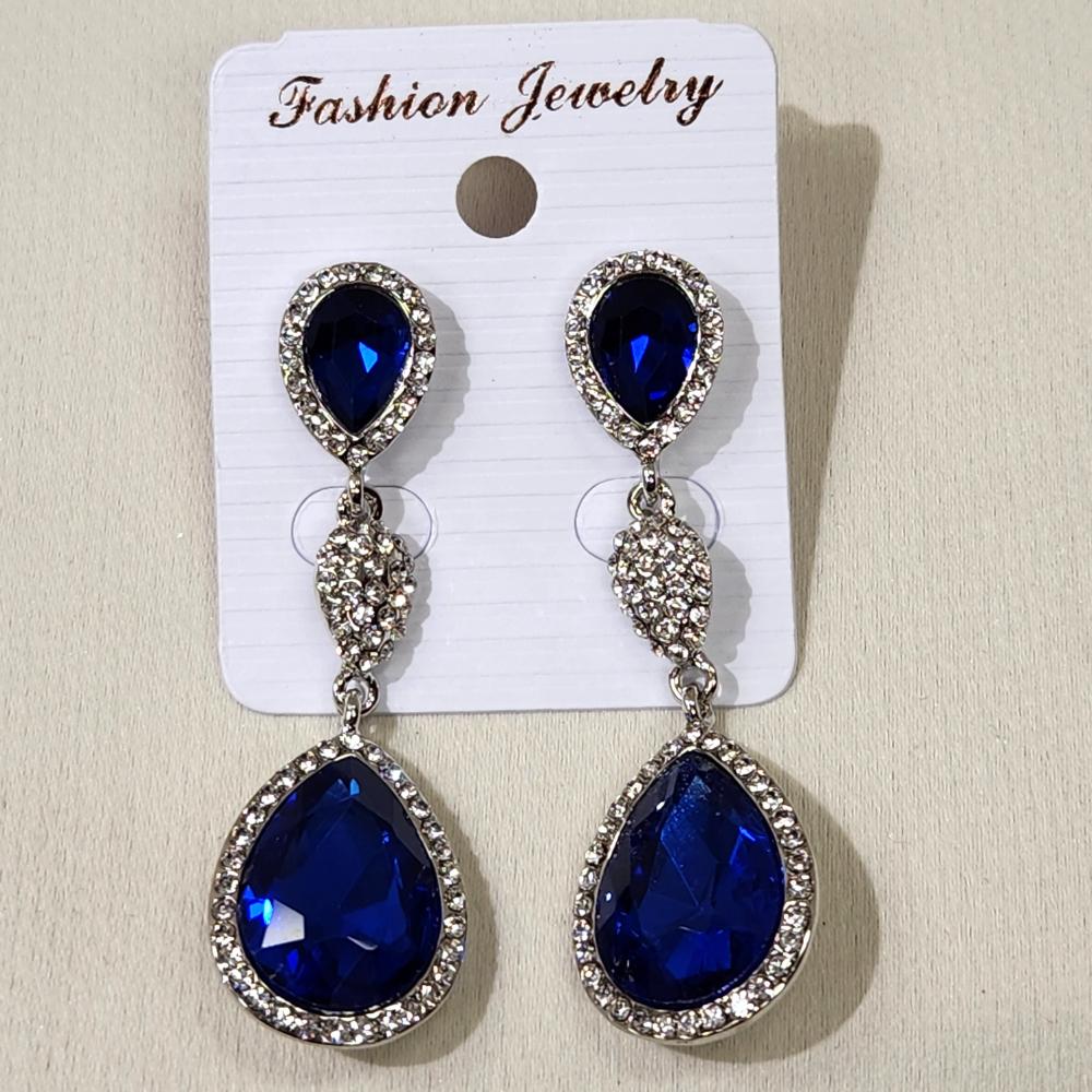Another view of Silver frame dangle earrings with clear and blue stones