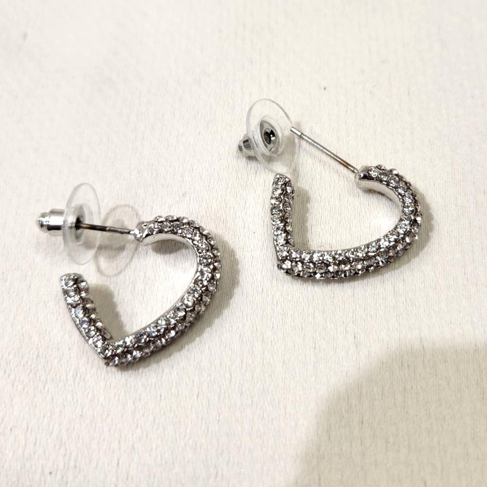 Pushback post of half-heart shaped hoop earrings