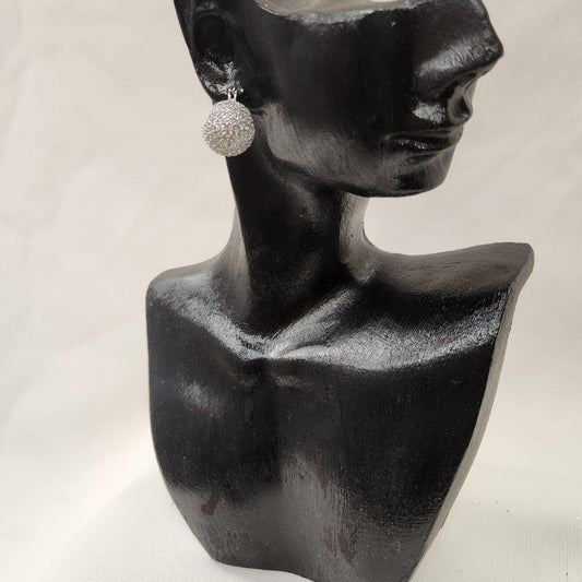 Front view of Stone studded basket hoops in silver frame