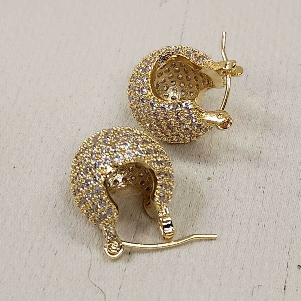 Lever back post of gold basket hoop earrings