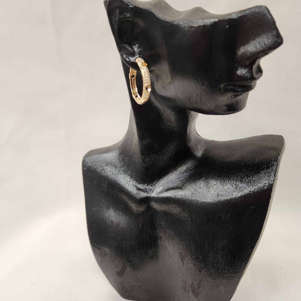 Gold hoop earrings with embossed hearts