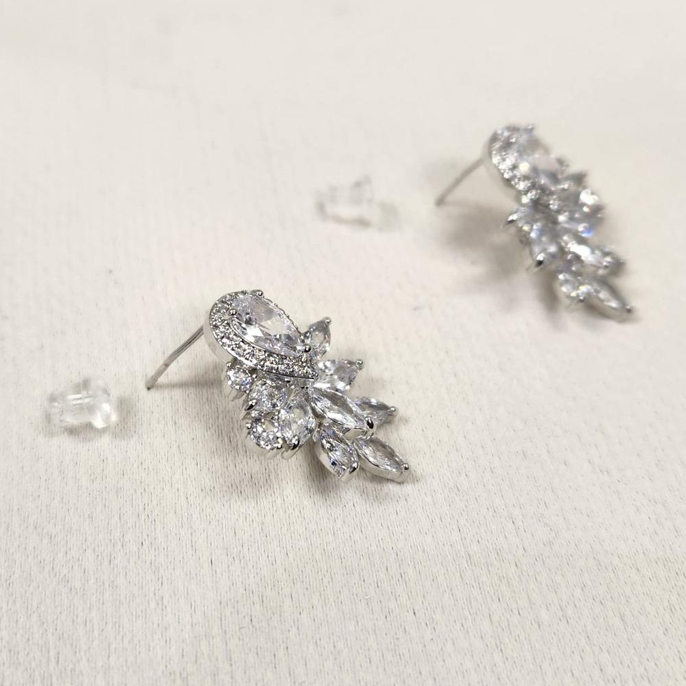 Pushback post of sparkly stud earrings