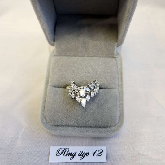 Elegant Vee shaped ring adorned with clear stones