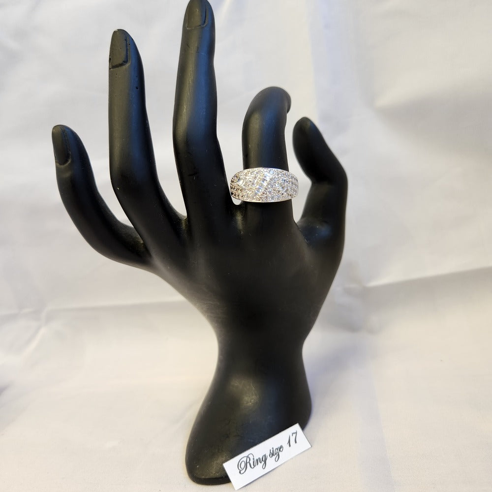 Broad band ring displayed on mannequin stand