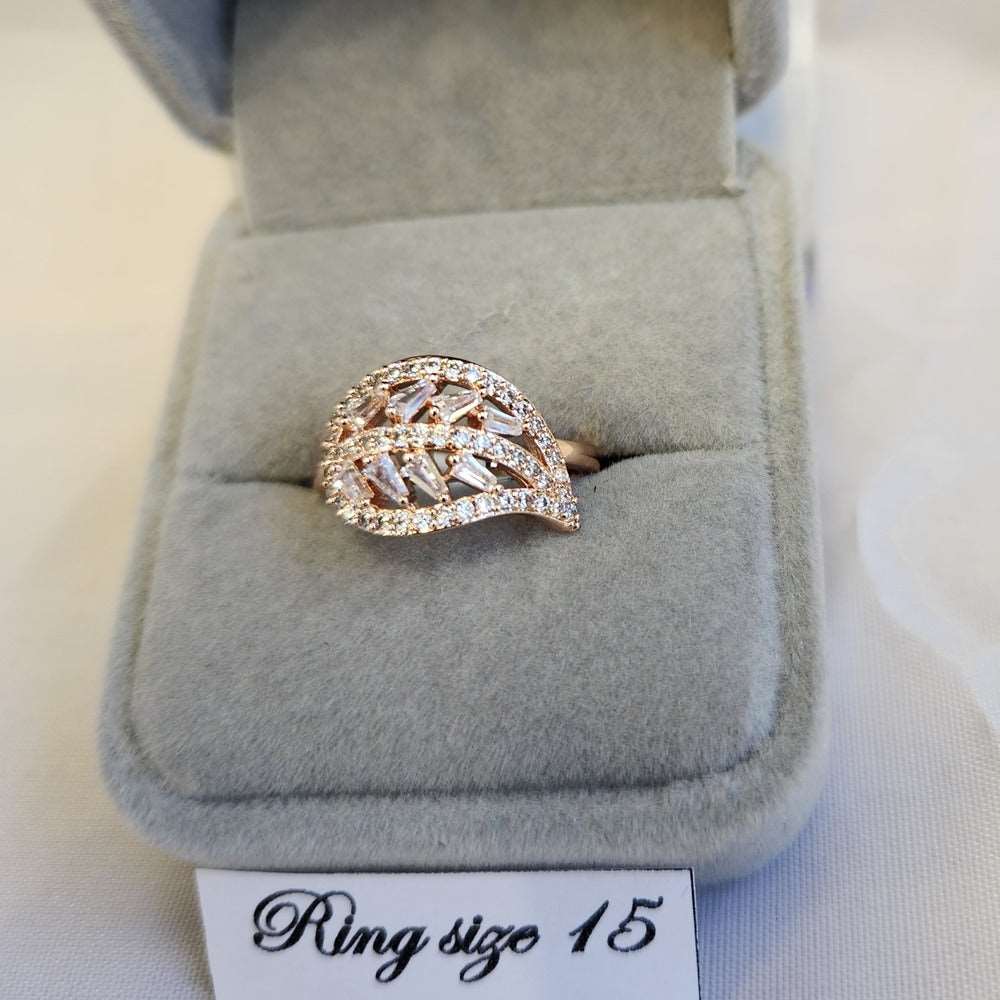 Detailed view of Delicate leaf shaped rose gold stone studded ring