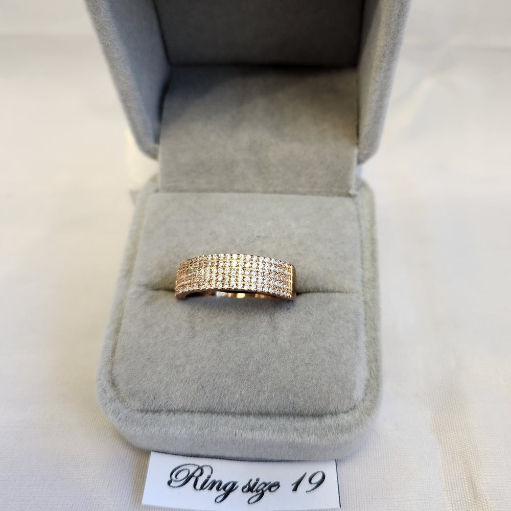 Rose gold ring band with five rows of finely set stones