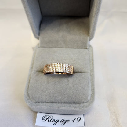 Rose gold ring band with five rows of finely set stones