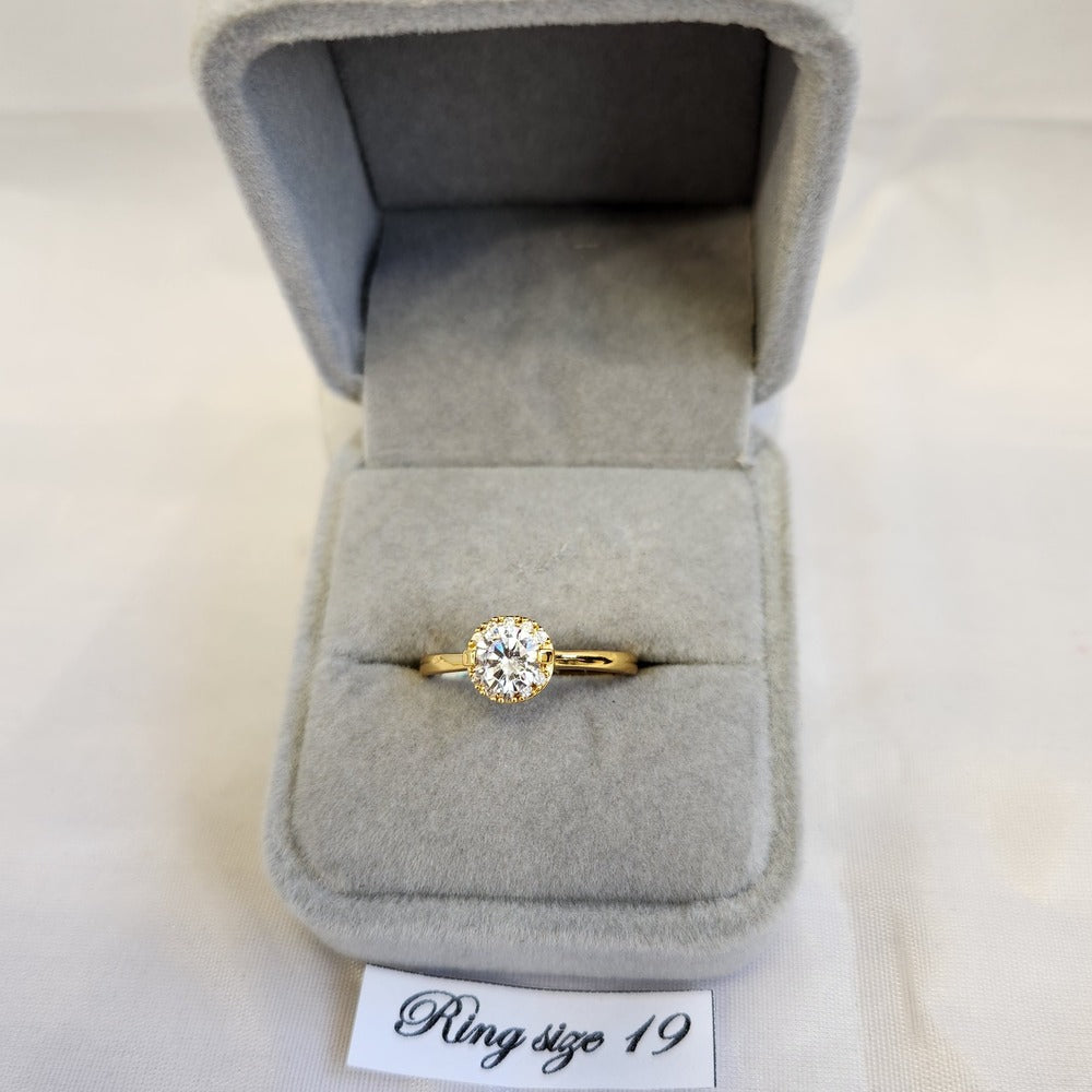 Simple halo style gold frame ring
