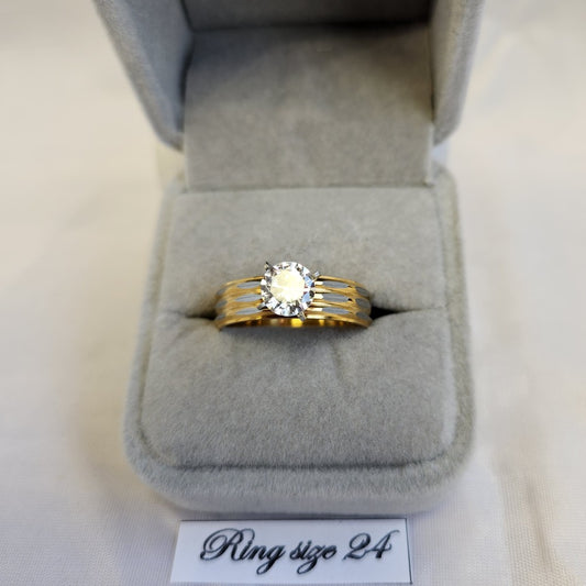 Dual tone ring with dazzling prong set stone