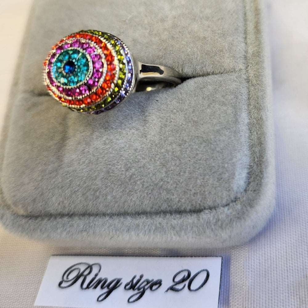 Detailed view of dome design ring with rows of colorful stones