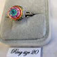 Detailed view of dome design ring with rows of colorful stones