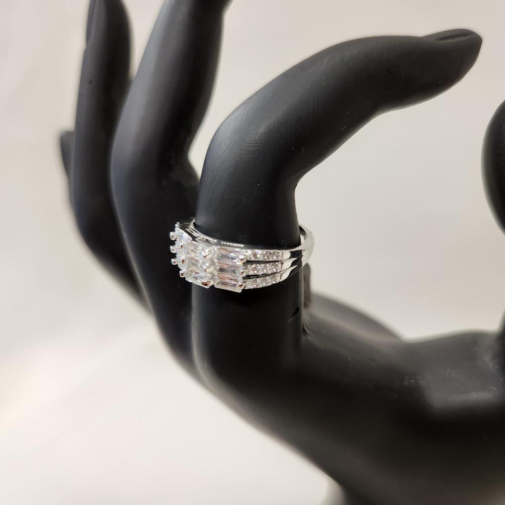 Side view of ring with center piece composed of baguette stones