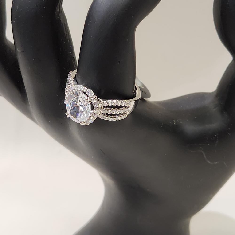 Detailed view of Exquisite silver ring with sparkling round center stone