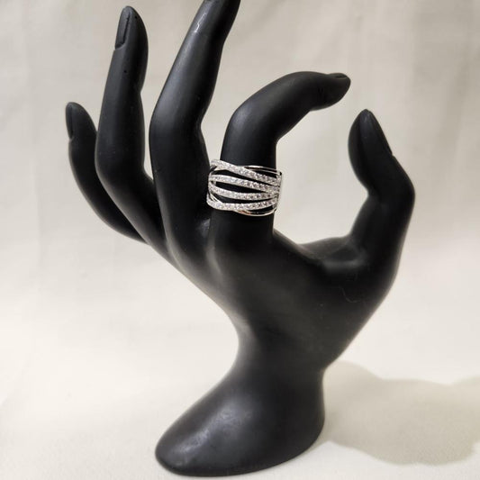 Silver hued wide band stone studded ring