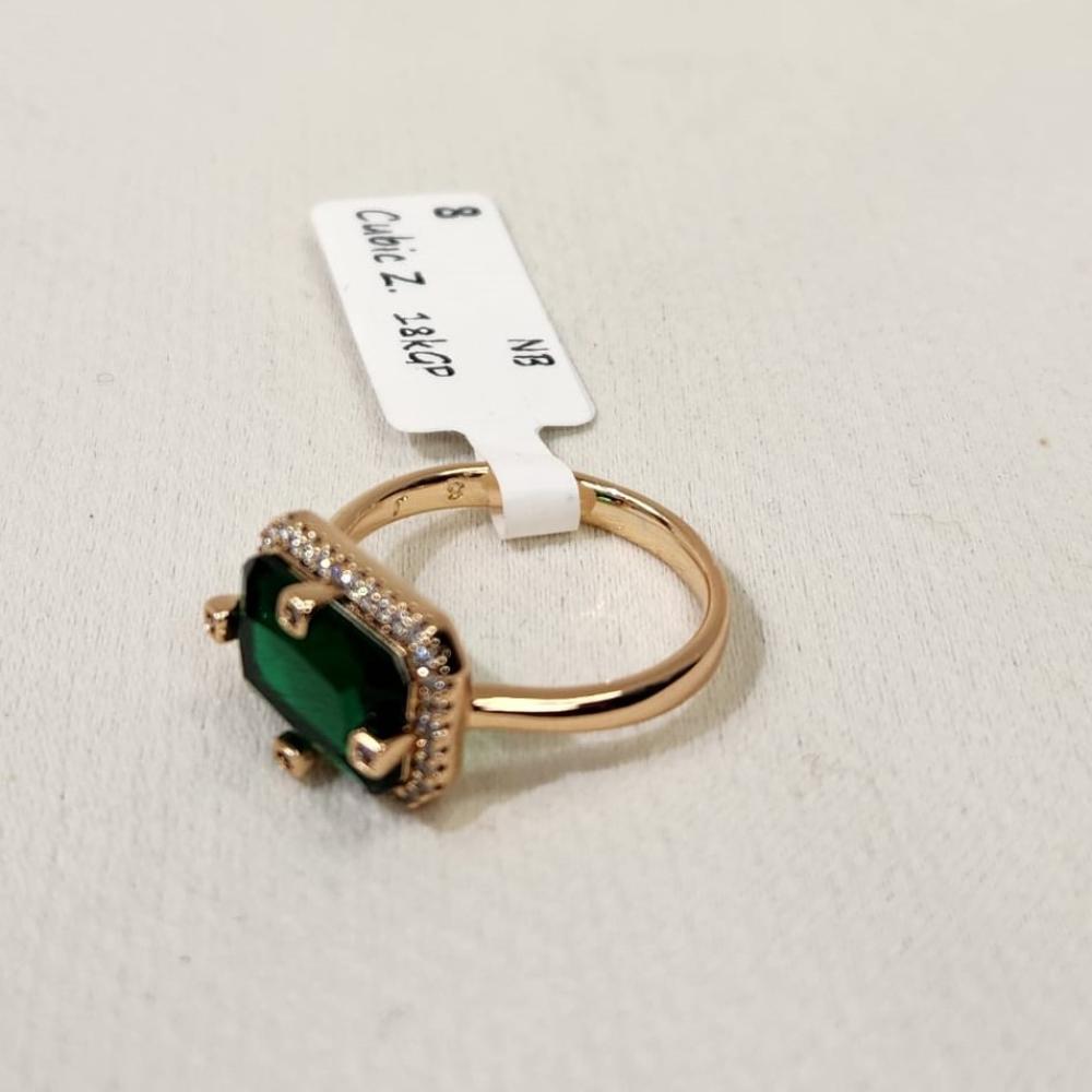 Alternative view of Gold ring with green baguette shaped center stone