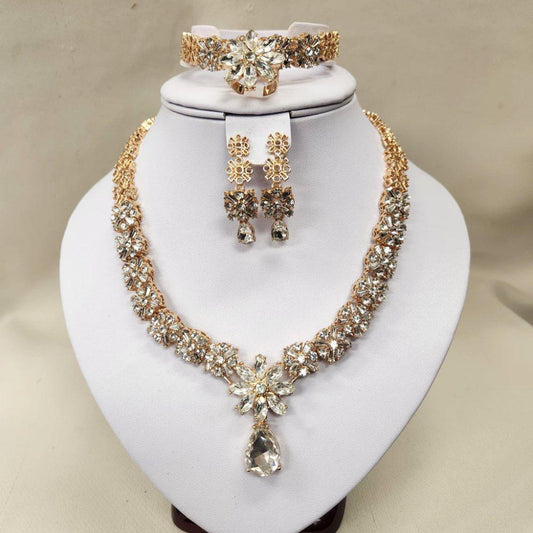 Elegant five piece gold frame jewelry set with stones