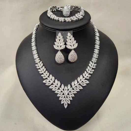 Elegant five piece silver hued cubic zirconia jewelry set