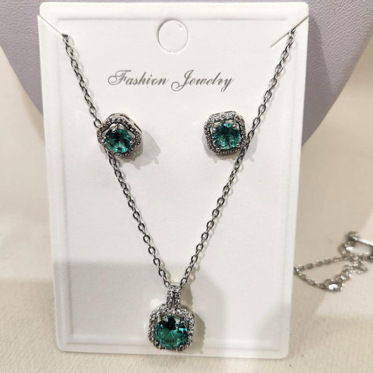 Three piece jewelry set with mint green and clear stones