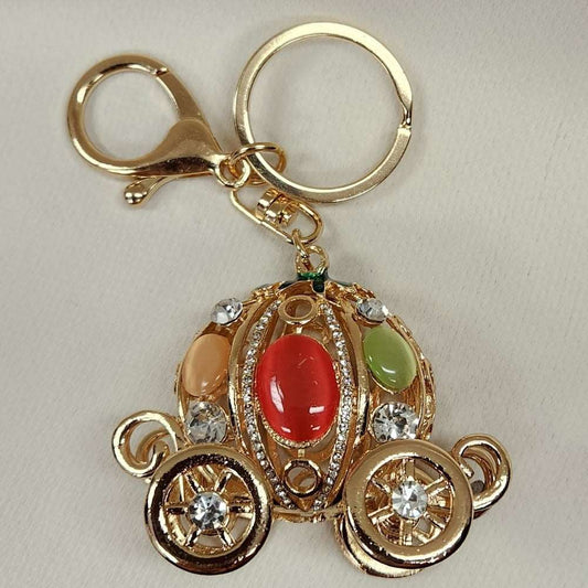Decorative coach shaped purse charm