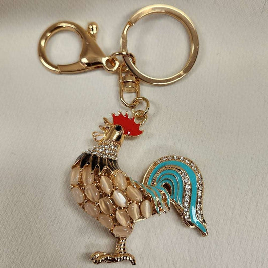 Full view of colorful rooster shaped purse charm