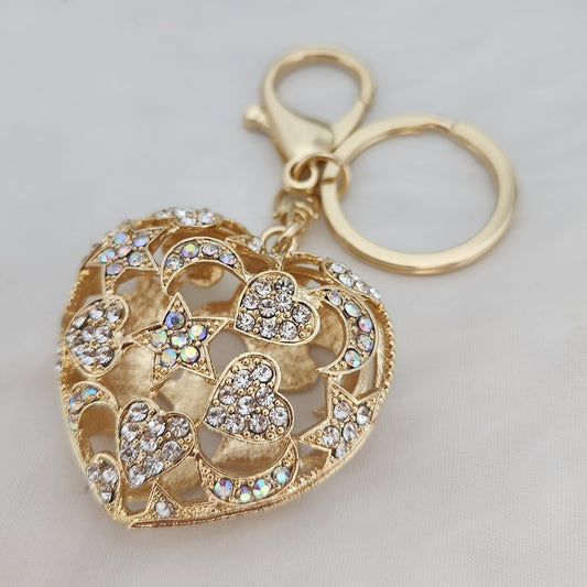 Heart shaped gold color purse charm