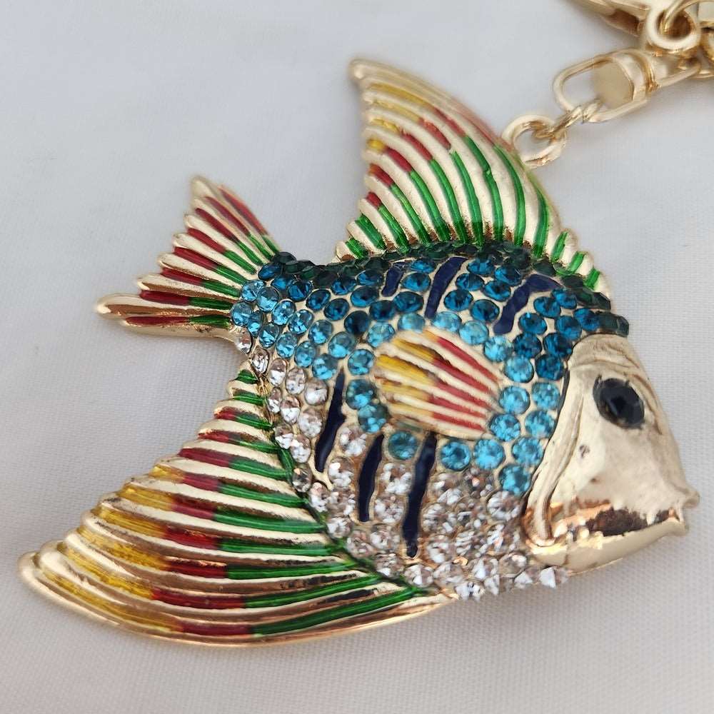 Colorful stones on fish shaped purse charm