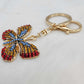 Gold color keyring on bright colorful butterfly purse charm