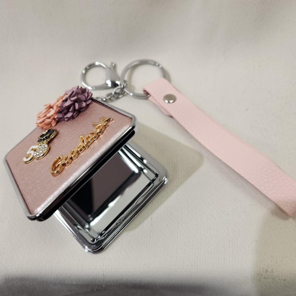 Another view Mirror purse charm in pearly pink finish