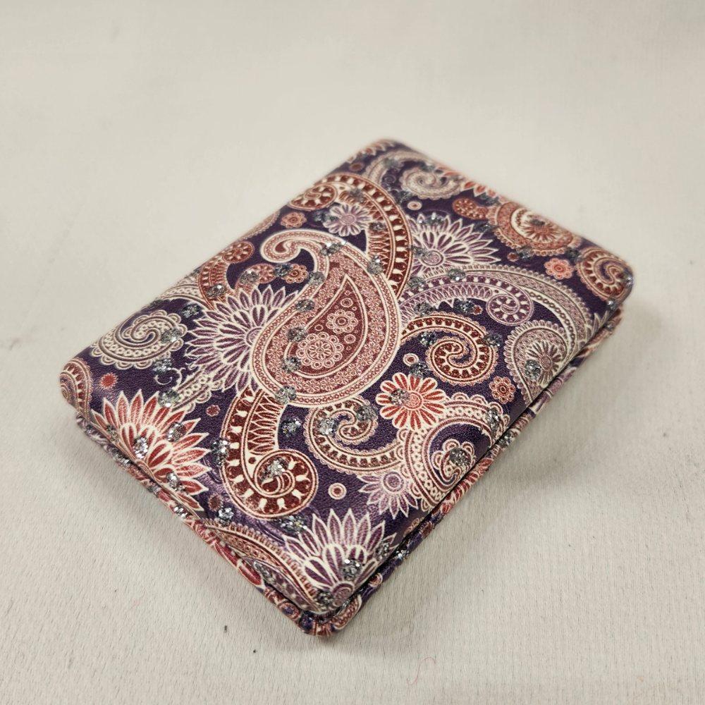 Colorful pocket mirror in ethnic paisley pattern