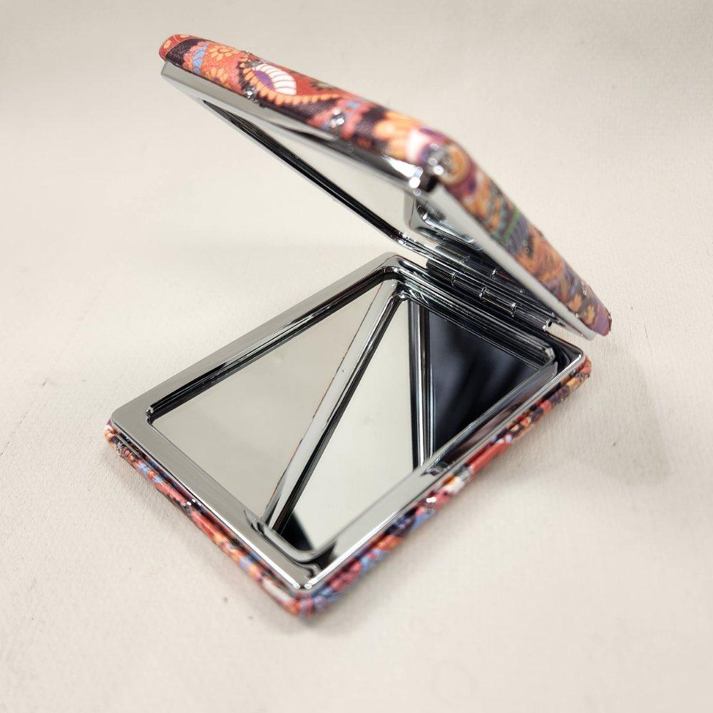 Pocket mirror in vibrant ethnic print when opened