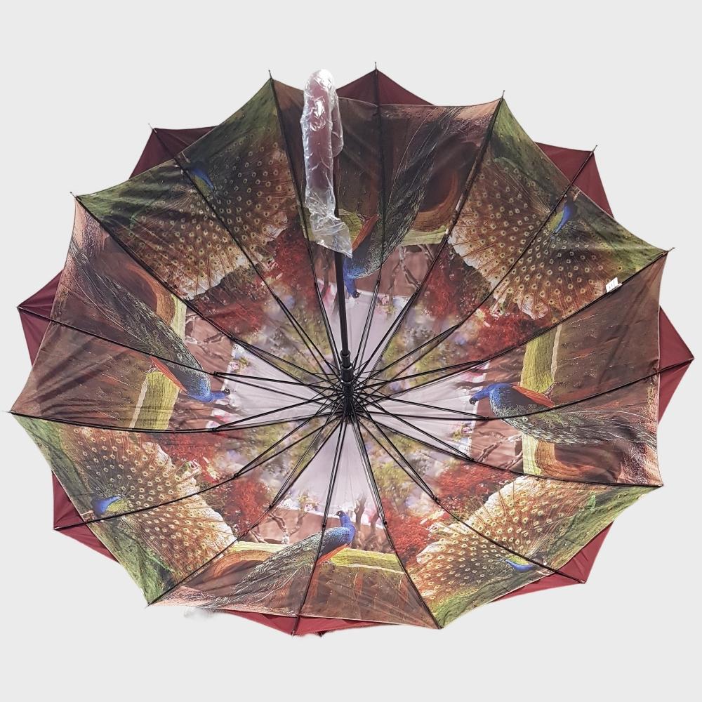 View of inner canopy in vibrant animal print of burgundy umbrella