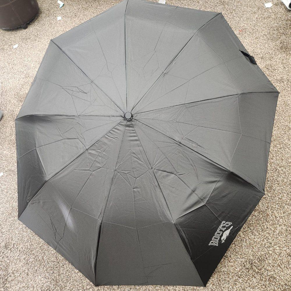 Roots extra coverage light weight umbrella in black when opened