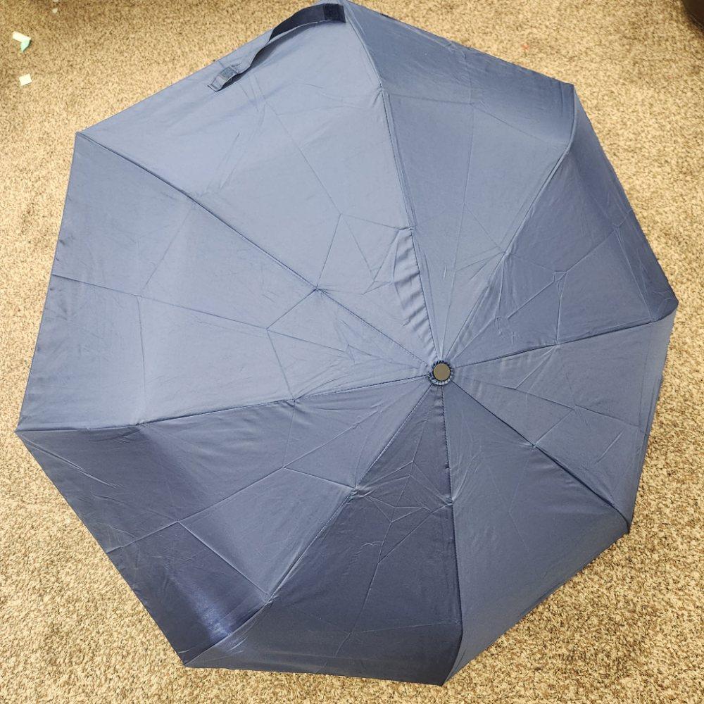 Light weight Belami umbrella in blue color when opened