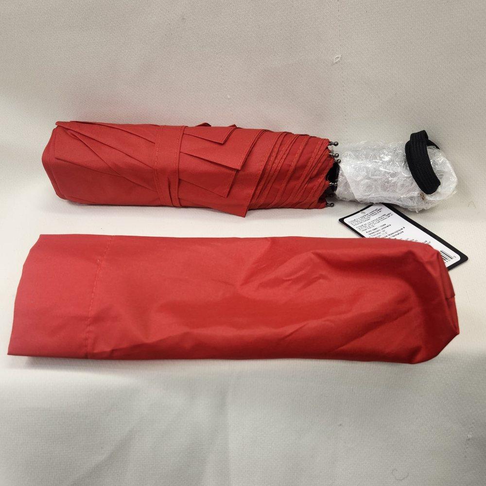 Light weight Belami umbrella in red color when closed