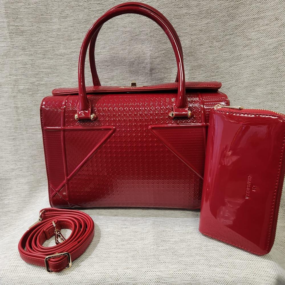 Another view of Red patent Fold-top handbag with matching wallet
