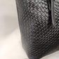 Detailed side view of David Jones textured bag in black color