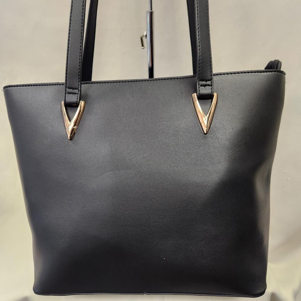 Detailed front view of black handbag