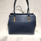 Mid size blue colored handbag