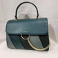 Stylish teal green color graded handbag