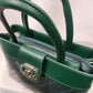 Top view of Mid size green patent front handbag